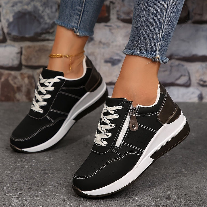 Låga sneakers med snörning för kvinnor