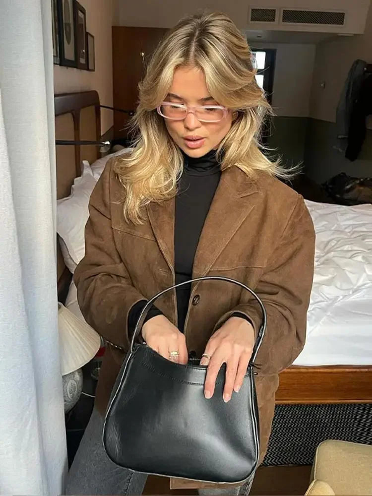 Sigrid | Jacka dam oversized med markerade axlar och knappar