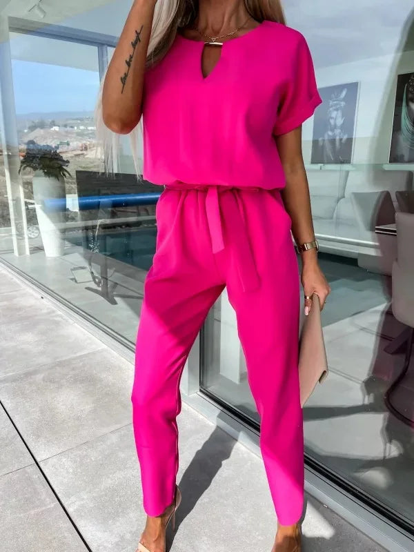 Elegant damjumpsuit med bälte och v-ringning