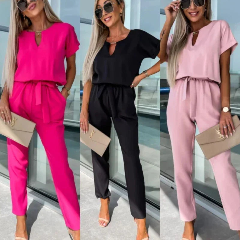 Elegant damjumpsuit med bälte och v-ringning