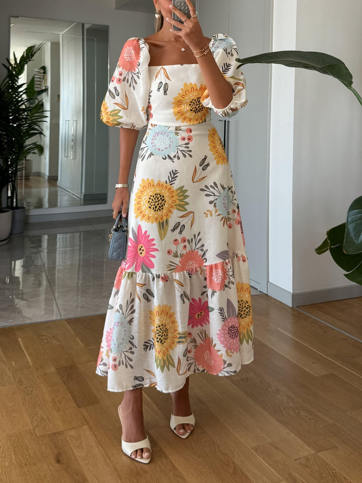 Elegant midiklänning med puffärmar