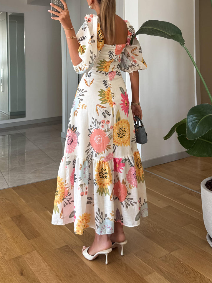 Elegant midiklänning med puffärmar