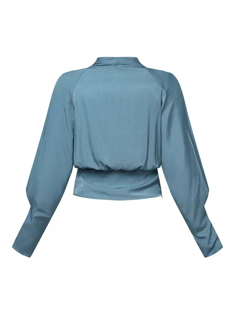 Damblus med v-ringning och drapering