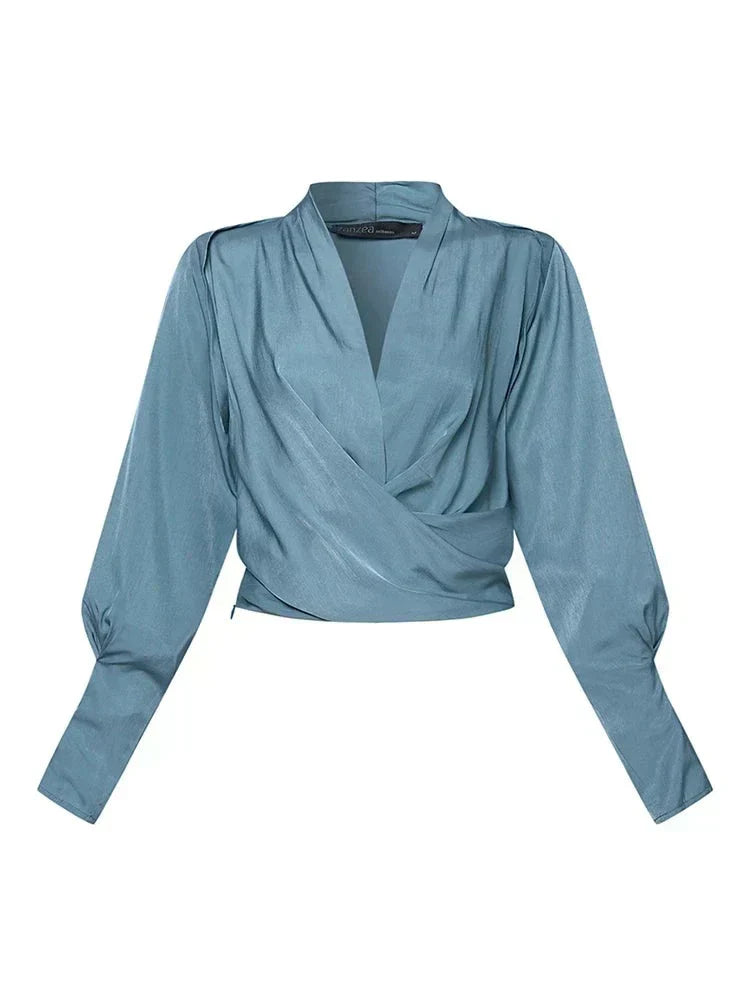 Damblus med v-ringning och drapering