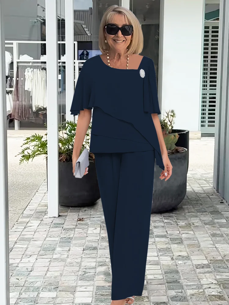 Elegant damset med blus och byxor
