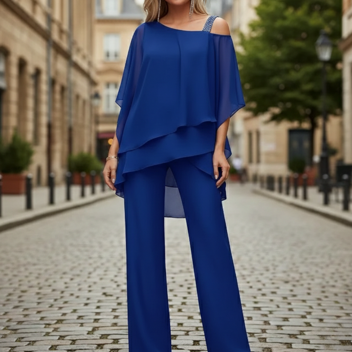 Damset: vida byxor med blus