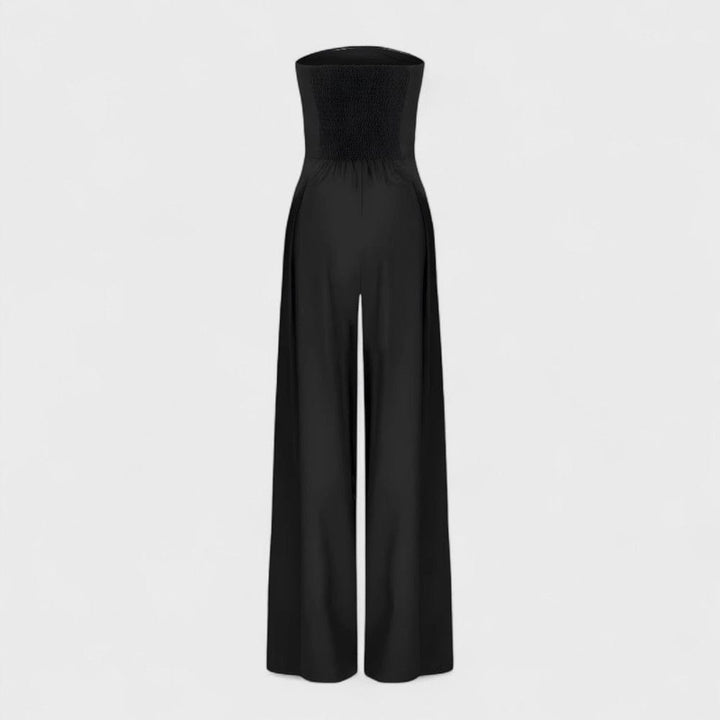 Axelbandslös jumpsuit med vida ben och fickor för kvinnor