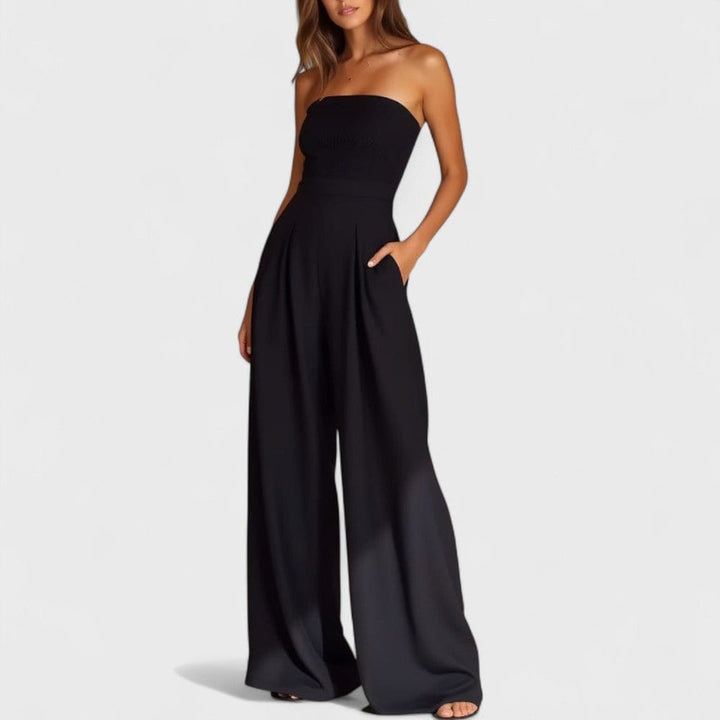 Axelbandslös jumpsuit med vida ben och fickor för kvinnor