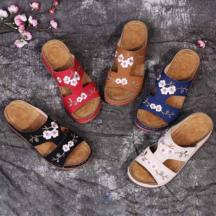 Ortopediska blommiga platåflip-flops för kvinnor