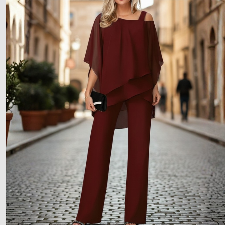 Damset: vida byxor med blus