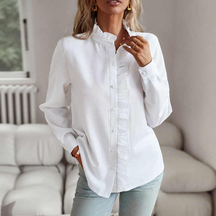 Elegant damskjorta med manschettkrage och långa ärmar